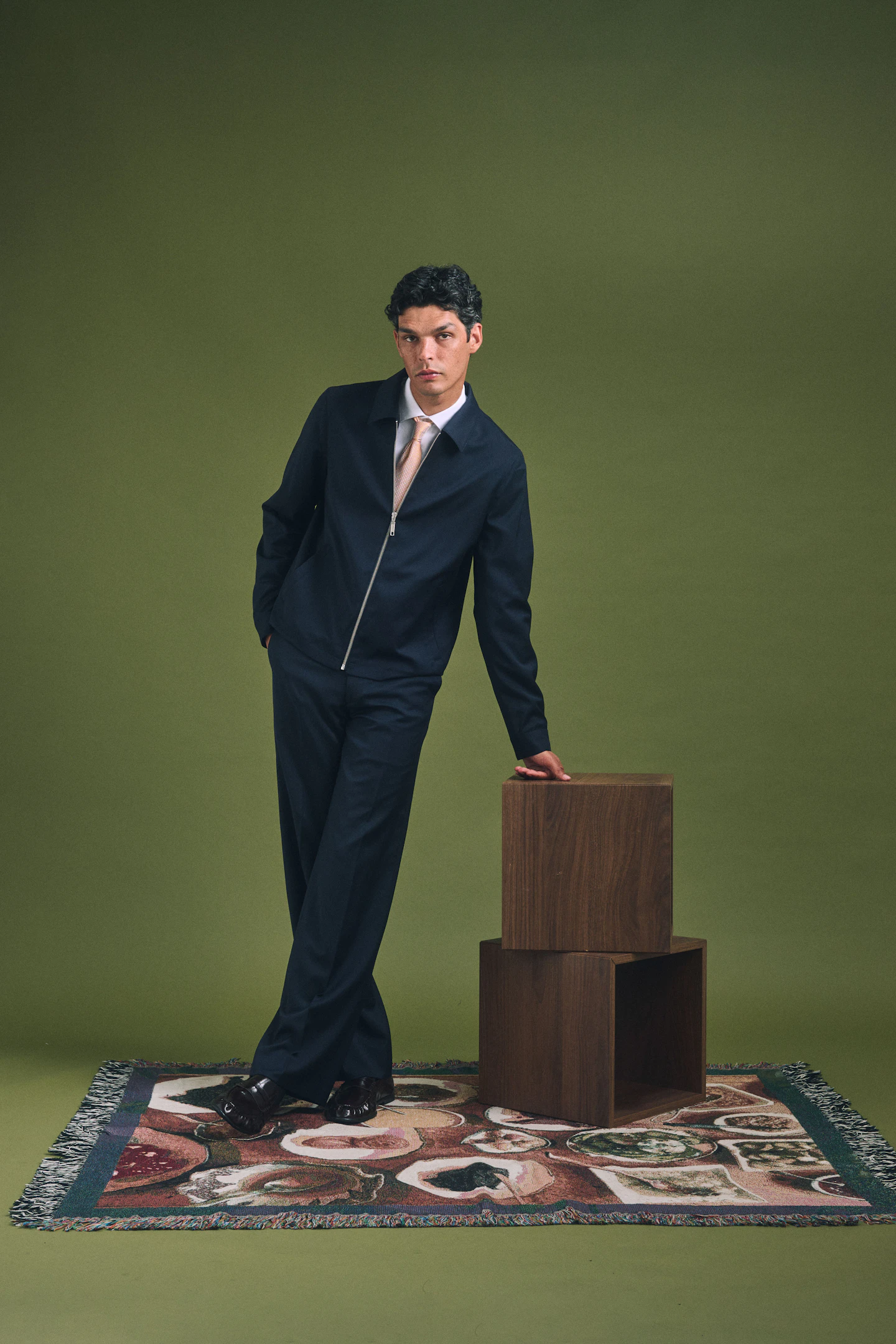 Full-length view of the Roccapietra Loro Piana navy wool zip jacket