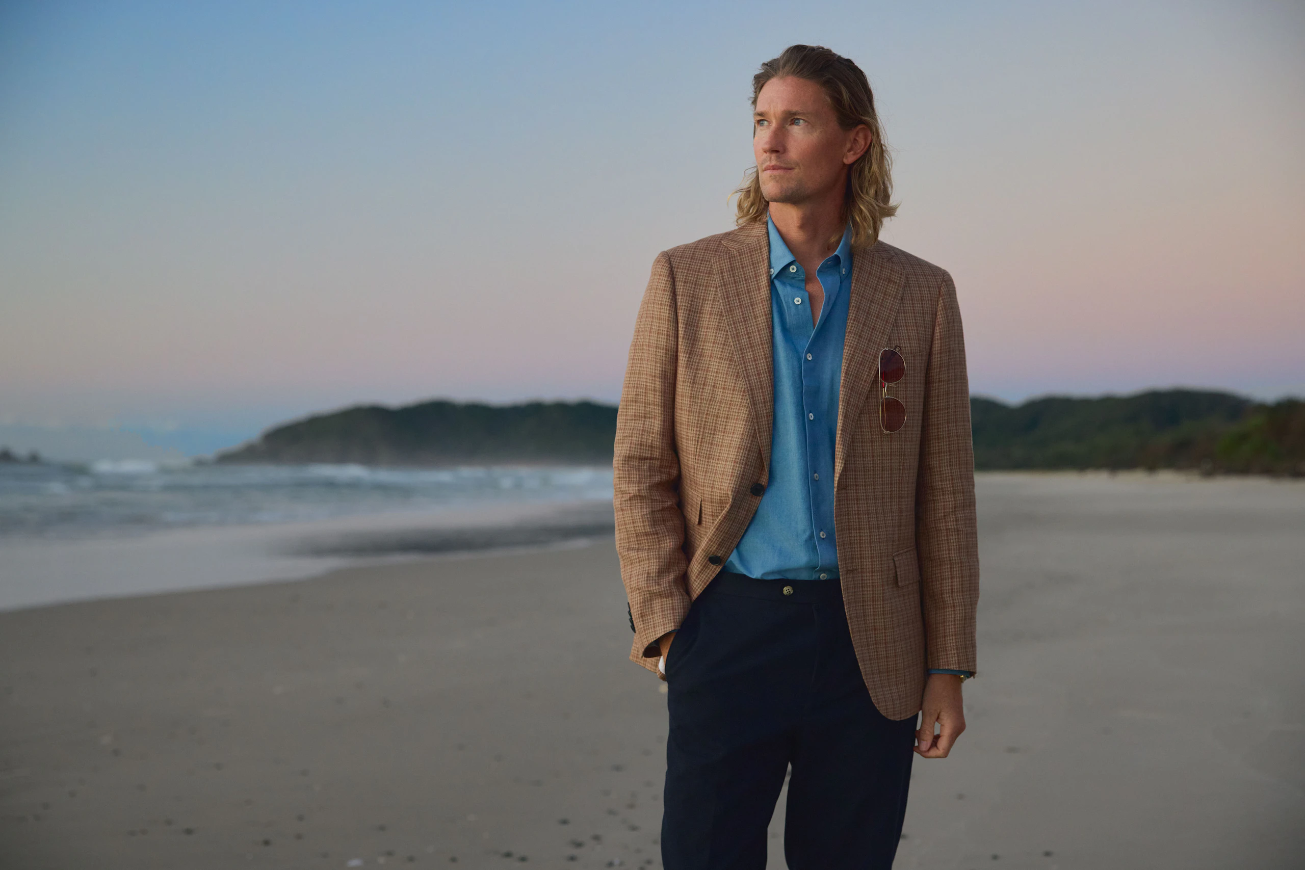 The Albany tan check linen jacket over the Geelong blue chambray cotton shirt, by the water
