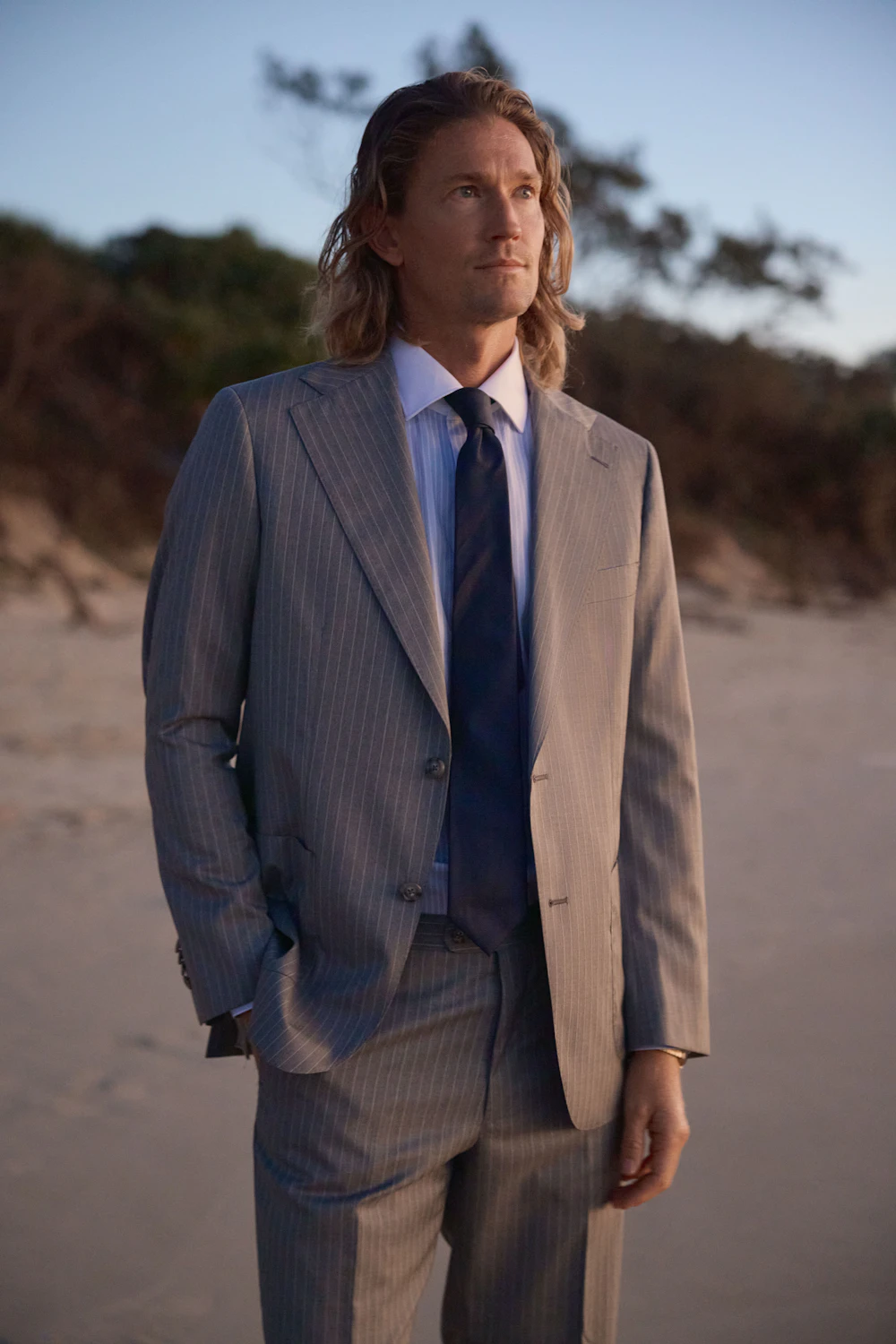 The Bunbury wool suit, worn with a tie