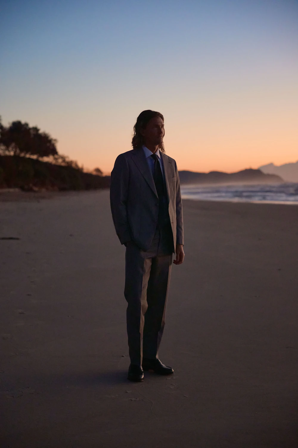 Full-length view of the Bunbury wool suit on the beach